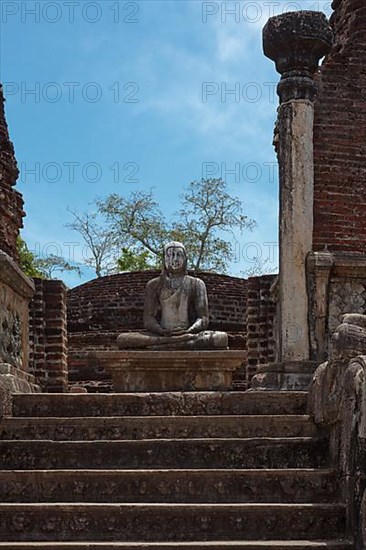 Ancient sitting Buddha image in votadage. Pollonaruwa