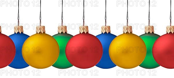 Row pf hanging Christmas baubles isolated on white background