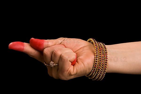 Woman hand showing Suuchi hasta