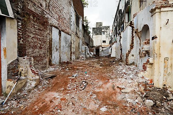 Street with ruins of demolished houses. Chennai