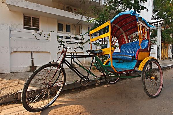 Empty bicycle rickshaw in street. Pondicherry