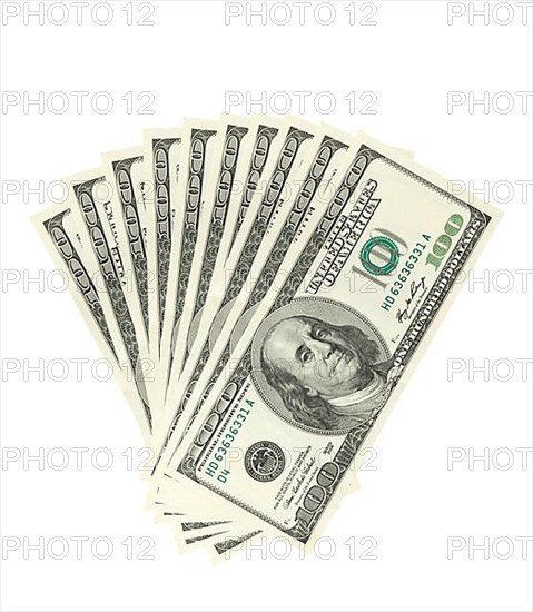 Hundreds of dollars spread on white background