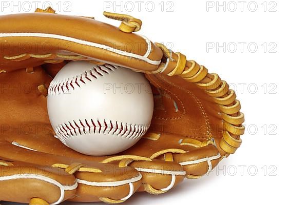 Baseball catcher mitt with ball isolated on white background close up
