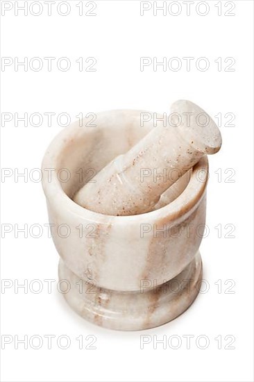 Marble mortar and pestle isolated on white background