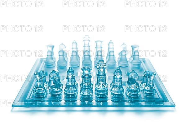 Glass chess on chess board