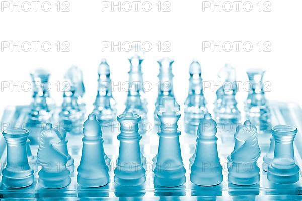 Glass chess on chessboard