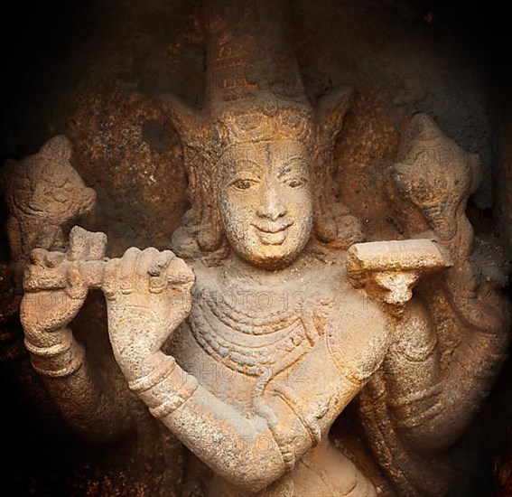 Krishna bas relief in Hindu temple. Sri Ranganathaswamy Temple. Tiruchirappalli