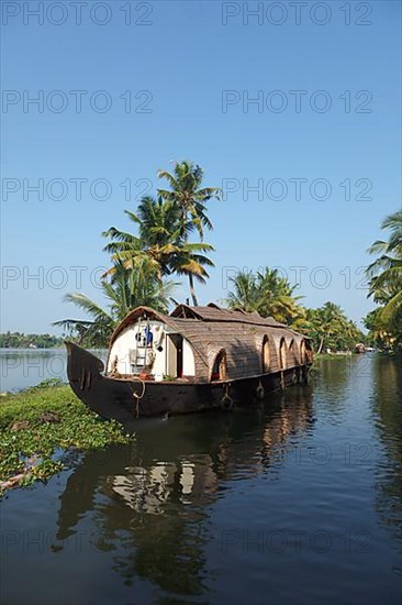 Traditional houseboat on Kerala backwaters. Kerala