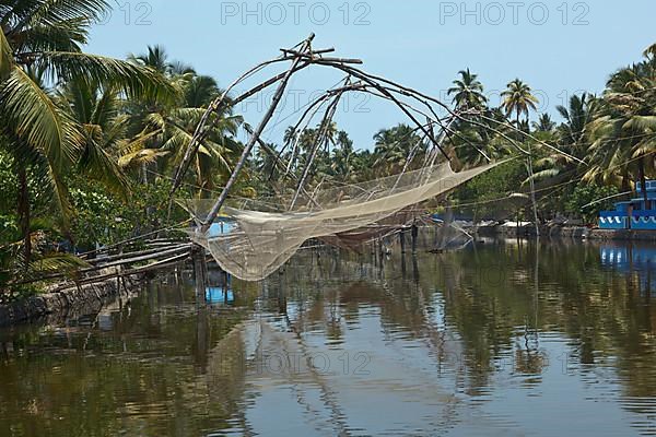 Traditional Chinese fishnets at Kerala backwaters. Kerala