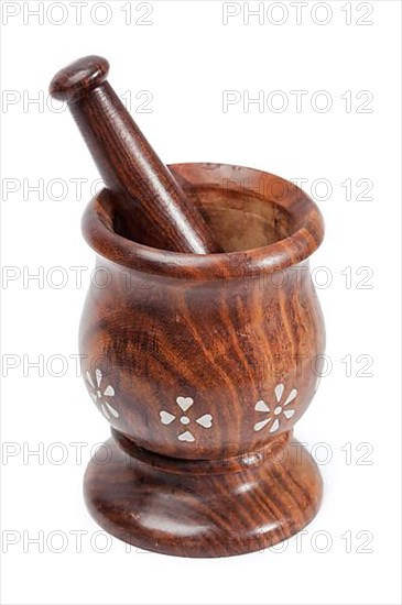 Wooden mortar and pestle isolated white background
