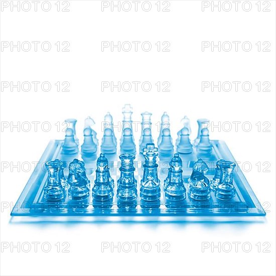 Glass chess on chess board