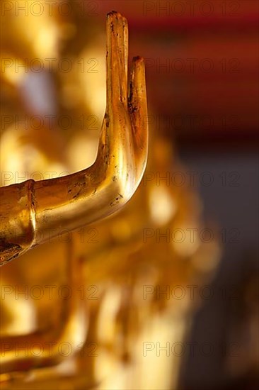 Buddha golden statue blessing hand
