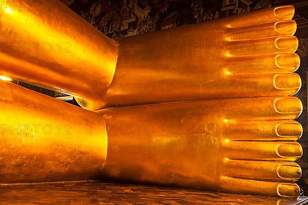 Reclining Buddha statue feet close up. Wat Pho