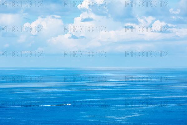 Speeding boat in blue sea. Andaman Sea