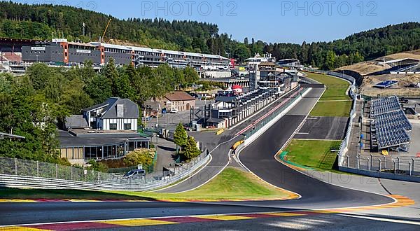 Panoramic view from 40 metres high hilltop above the steep Raidillon driveway on the dangerous Eau Rouge bend of the Spa Francorchamps circuit