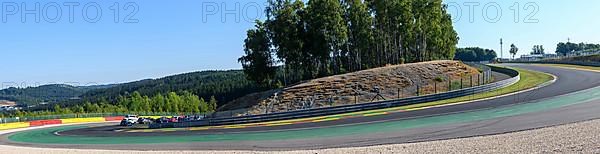 Panoramic photo of steeply descending turn 8 of Circuit de Spa Francorchamps