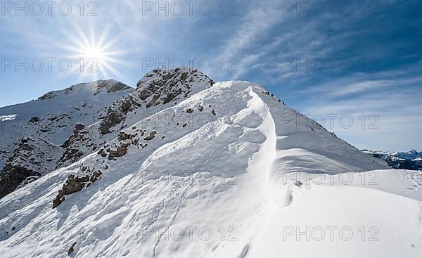 Snow cornices at an embrasure