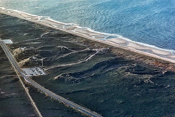 View of car park and driveway to the cult restaurant Sansibar in the dunes