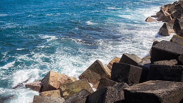 Coast with concrete breakwaters