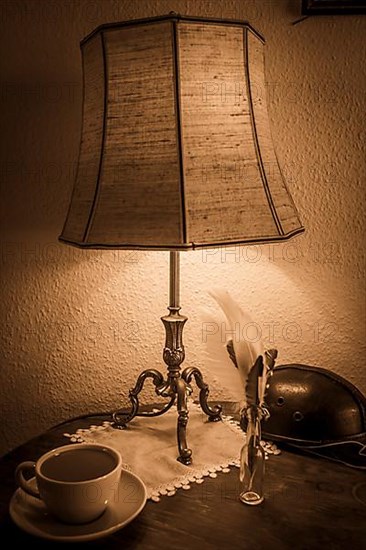 Lamp on table with coffee