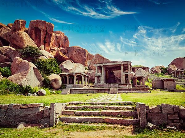 Vintage retro effect filtered hipster style image of tourist indian landmark Ancient ruins in Hampi. Hampi Bazaar