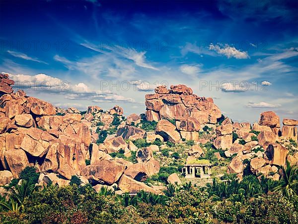 Vintage retro effect filtered hipster style image of ancient ruins of Hampi. Karnataka