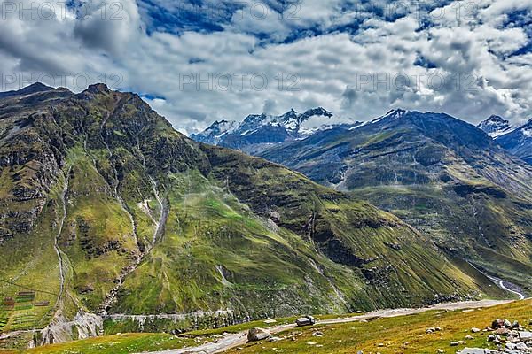 Lorry truck on road in Himalayas. Descend from Rohtang La pass to Lahaul valley. Himachal Pradesh