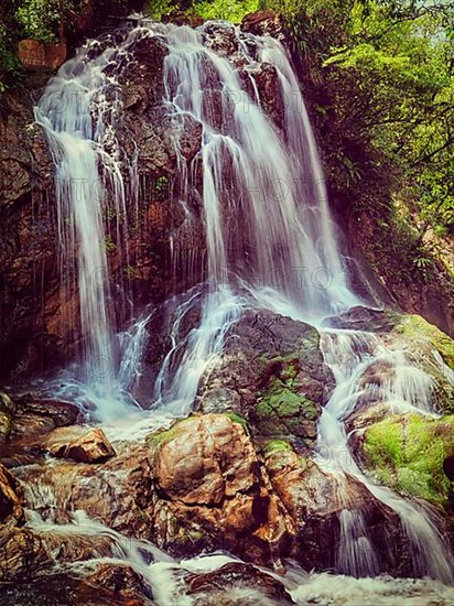 Vintage retro effect filtered hipster style image of Tien Sa Waterfal near Cat Cat Village near