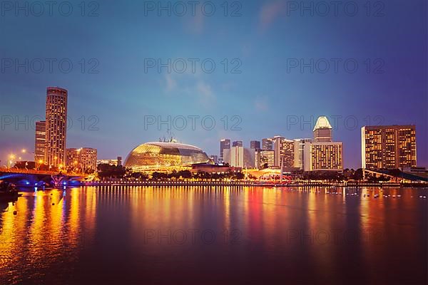 Vintage retro effect filtered hipster style image of Singapore cityscape skyline night view