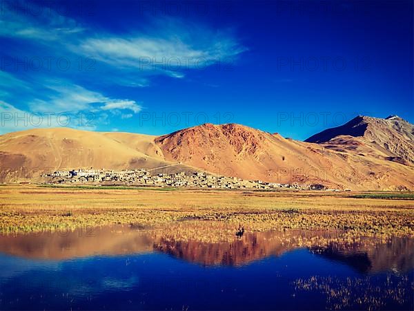 Vintage retro effect filtered hipster style image of Korzok village on Tso Moriri in Himalayas