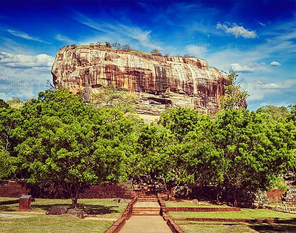 Vintage retro effect filtered hipster style image of Sigiriya rock