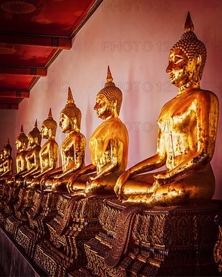 Vintage retro effect filtered hipster style image of sitting Buddha statues in Buddhist temple Wat Pho