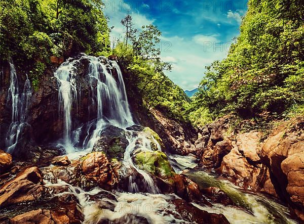 Vintage retro effect filtered hipster style image of Tien Sa Waterfal near Cat Cat Village near