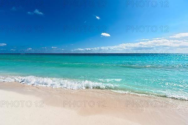 Beautiful beach and waves of Caribean Sea. Riviera Maya