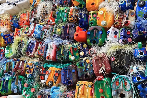 Wall with colourful canisters