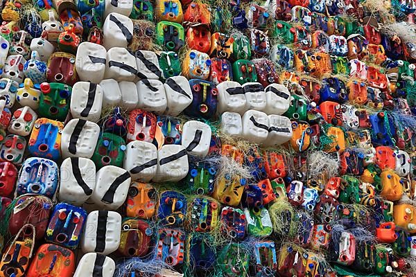 Wall with colourful canisters