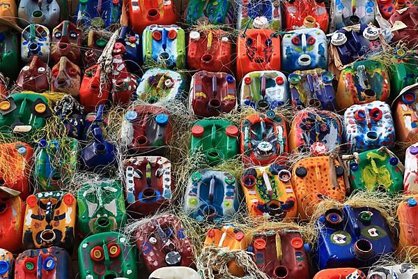 Wall with colourful canisters