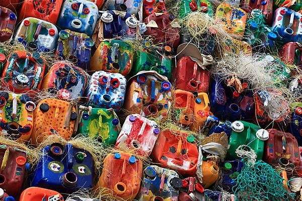 Wall with colourful canisters