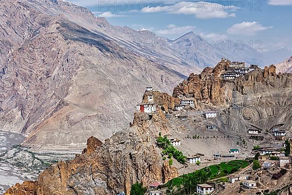Dhankar gompa Buddhist monastery on cliff and Dhankar village in Himalayas