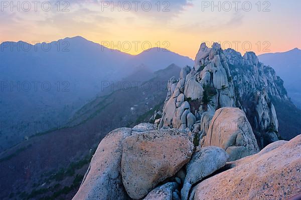 View of stones and rock formations from Ulsanbawi rock peak on sunset. Seoraksan National Park