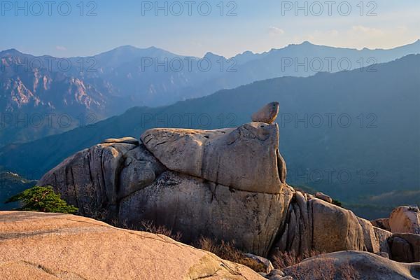 View of stones and rock formations from Ulsanbawi rock peak on sunset. Seoraksan National Park