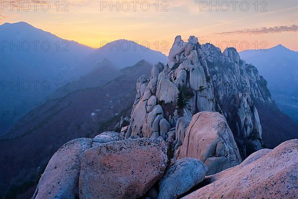 View of stones and rock formations from Ulsanbawi rock peak on sunset. Seoraksan National Park