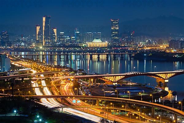 Aerial view of Seoul downtown cityscape and Seongsan bridge over Han River in twilight. Seoul