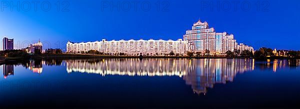 MInsk skyline panorama over Svisloch river in night. Minsk