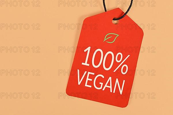 Red label with text '100% Vegan'