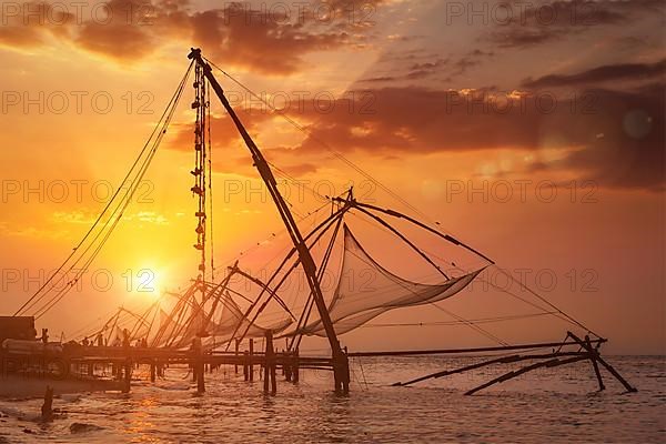 Kochi chinese fishnets on sunset. Fort Kochin