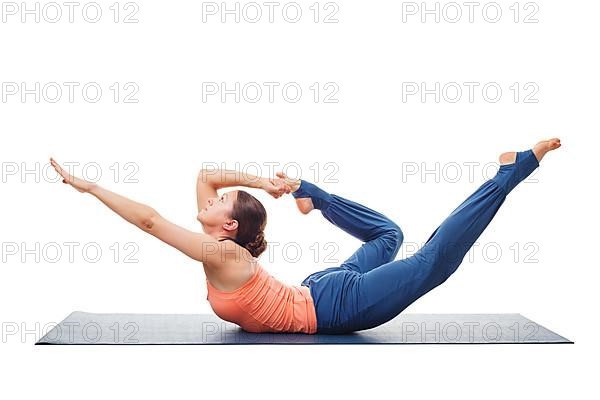 Sporty fit woman dooing yoga back bend asana Dhanurasana