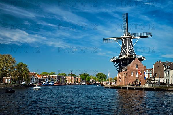 Harlem cityscape with windmill De Adriaan on Spaarne river. Harlem