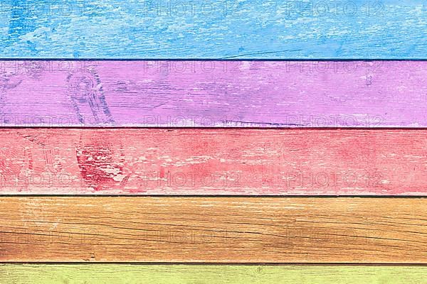 Background with colorful horizontal old wooden planks with chipped paint