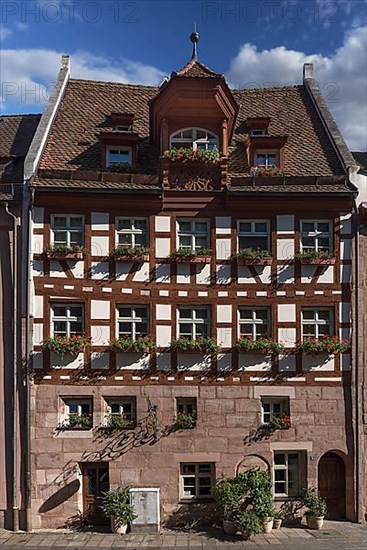 Historic half-timbered house with dormer window